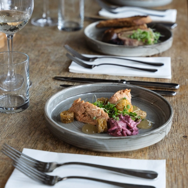 plates plated dishes on a table